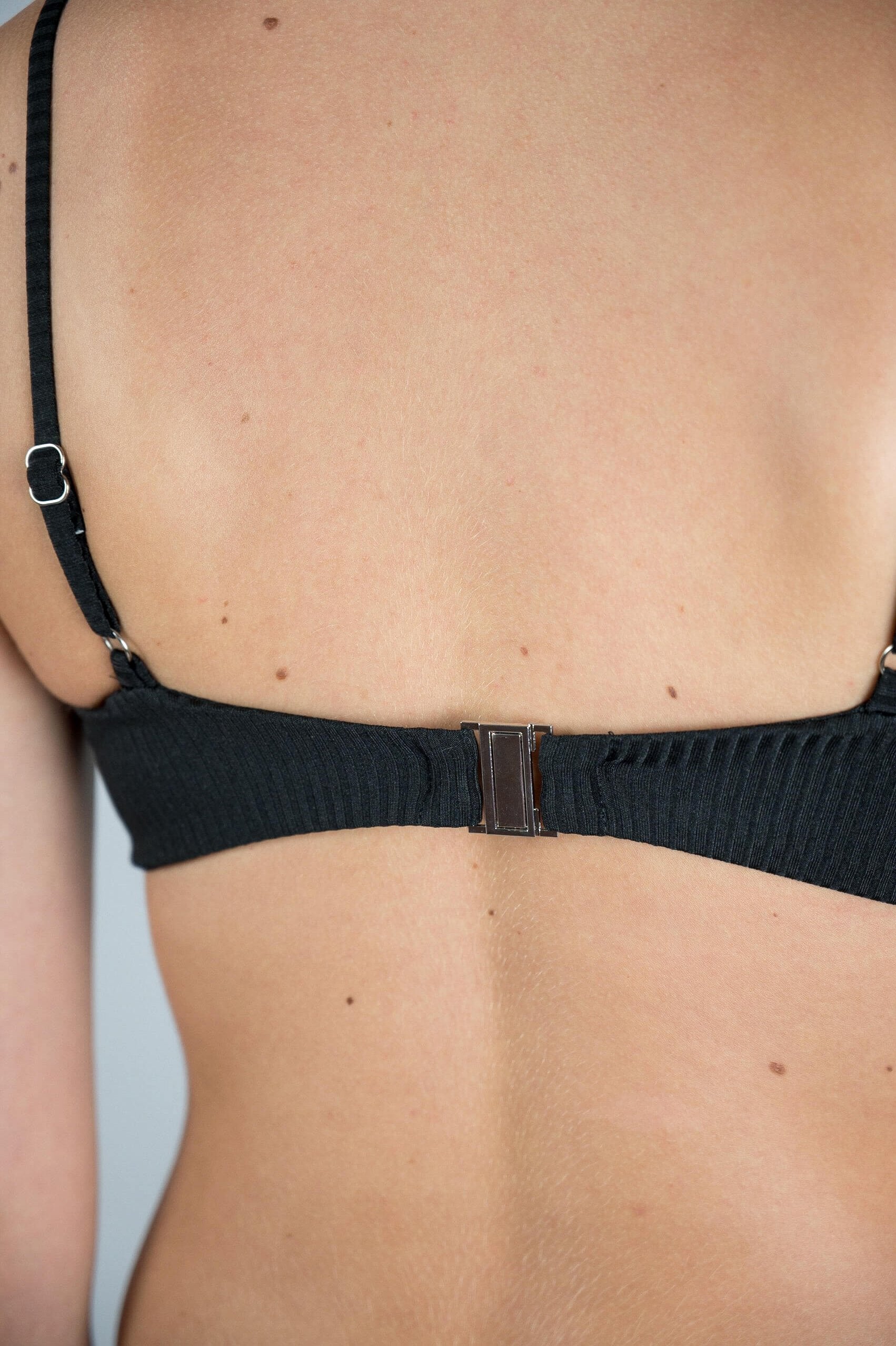 bayu tara sunday swim black zwart topje broekje mix and match bikini set swimsuit swimwear bottom top cute sporty chic yoga outside beachwear swimming body type sustainable recycled econyl soft bayu frankies hunkemoller lady gaga orange bikini stripes seamless sewing versatile loavies victorias secret (6875625193643)